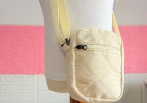 Bandolera porta celular beige
